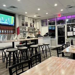 Cool little place. Lots of screens on wall for watching games. And the wall of taps (under the screens). Great concept!