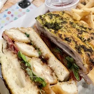 Crispy Apple Jack Chicken sando - with apple butter spread, cheese, arugula on an herb focaccia. Yum.
