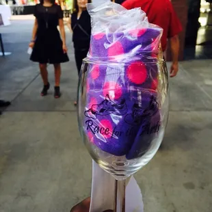 Wine glass with a pair of sock.. Hmmm