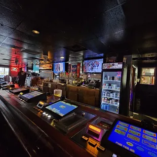 a row of televisions on the wall