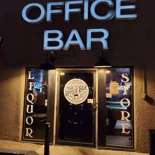 the entrance to the office bar