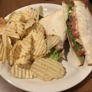 Tuna salad sandwich with potato chips