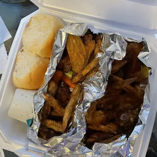 a meal in a styrofoam container