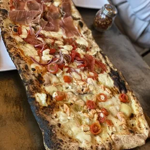 2 feet long pizza with 3 different types