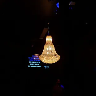 a chandelier in a dark room