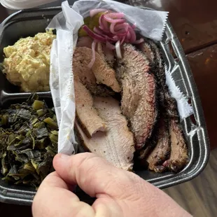 Brisket &amp; Turkey (unbelievably tender sliced smoked turkey breast!) w collard greens and potato salad.