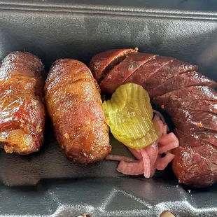 Armadillo eggs and al pastor sausage.