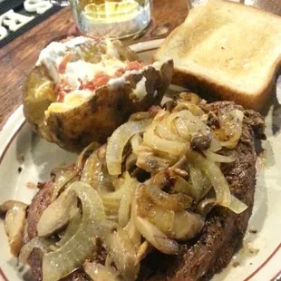 Ribeye..we had it 3 times smothered in grilled onions and mushrooms.  Loaded baked potato, salad and Texas toast.  This steak Is to die for.