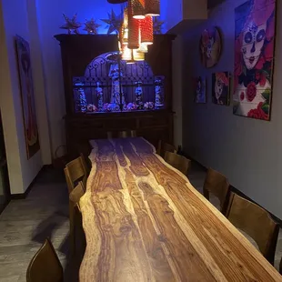 Beautiful wood table down a quiet dining section.