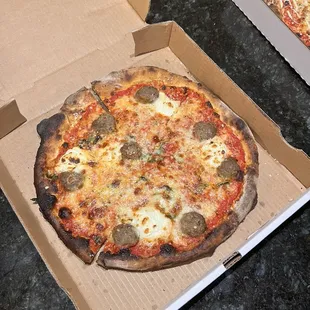 Meatball pizza ( 4 meatballs cut in half ) burned and tiny , barely any toppings was not worth it
