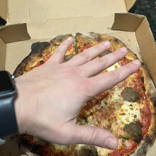 Tiny 12 inch pizzas barely any toppings . Enough for 1 person