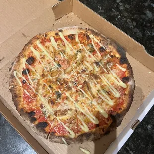 Fredo pizza tiny barely any chicken , burned not worth the price