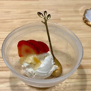 Vanilla ice cream with orange and strawberry
