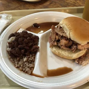 Smoked chicken sandwich with red beans and rice side. Tasted great!