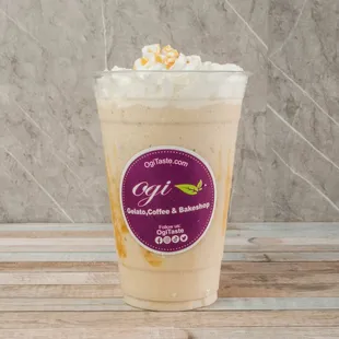 A well-blended mixture of fine caramel base, milk, caramel sauce, and ice, topped with whip cream and caramel drizzle