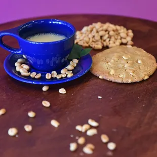 a cup of coffee and cookies