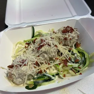Carbonara meatballs over zucchini meatballs