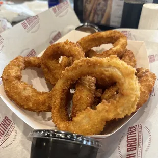 a basket of onion rings