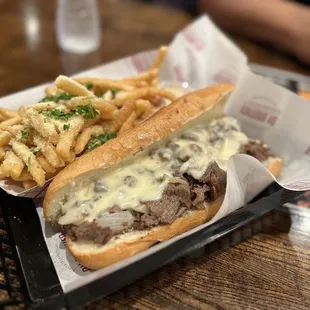 Cheesesteak with American cheese &amp; fried onions, GARLIC PARM FRIES