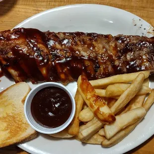 Full Slab BBQ Ribs + 1 Side = $14.00