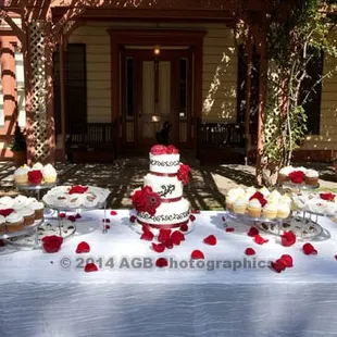 Neapolitan cake with non-dairy cream, lemon and carrot cake cupcakes, and chocolate-dipped strawberries.