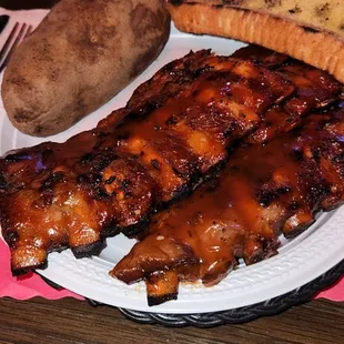 Ribs, bread, baked potato