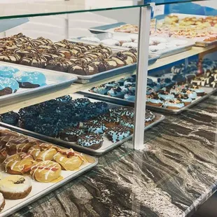 a variety of donuts on display