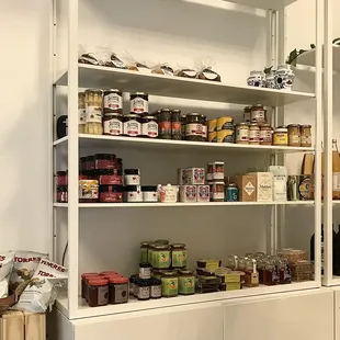 a shelf full of food items