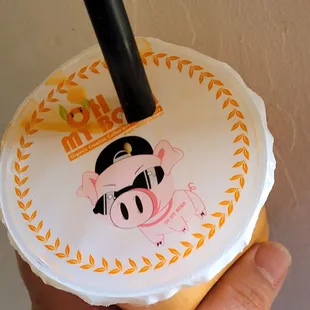 a person holding a cup of coffee