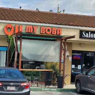 a car parked in front of a restaurant