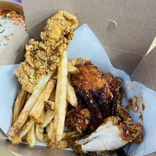 Spicy wings and fries.