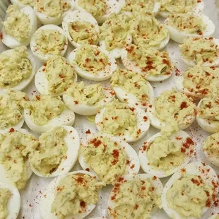 a tray of deviled eggs