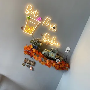 a neon sign for a coffee shop