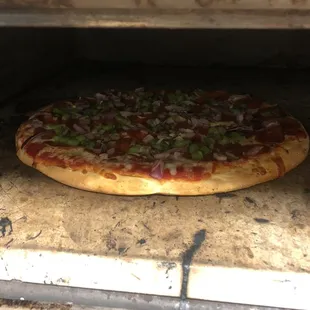 No conveyer belts here. We bake our pizzas on a pizza stone. It might take a little longer, but we think it's well worth the wait.