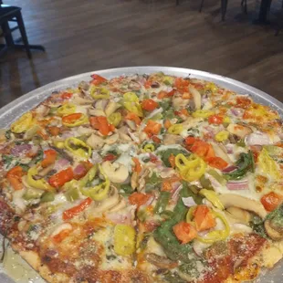 Veggie pizza..thin crispy crust. Served piping hot. No leftovers!!