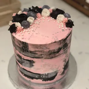 Pink black birthday cake
