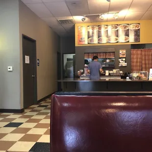 a restaurant with a checkered floor