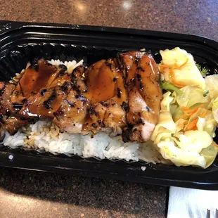 a meal in a styrofoam container