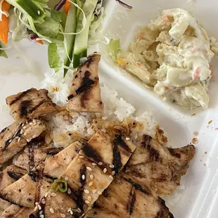 White meat chicken with rice, macaroni salad, and salad
