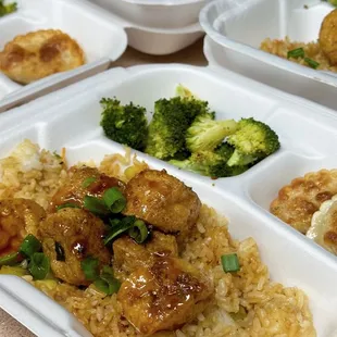 a close up of a meal in a styrofoam container
