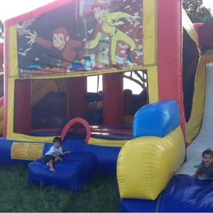 7 in 1 bounce house with Curious George