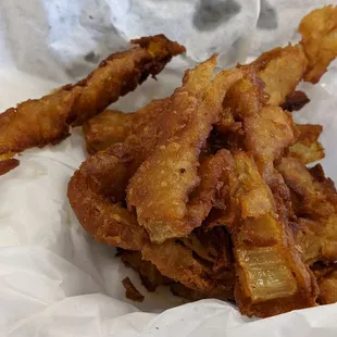 Believe it or not onion rings, is exactly how I received. hot but dripping in grease. I immediately dumped it. Never to return there.