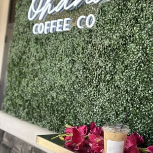 a cup of coffee and a flower