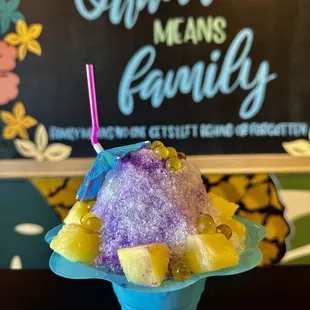 an ice cream sundae with pineapples