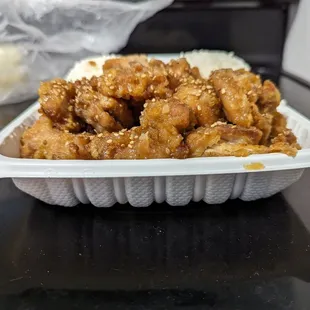 a take out container of food