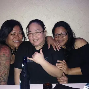 three women posing for a picture