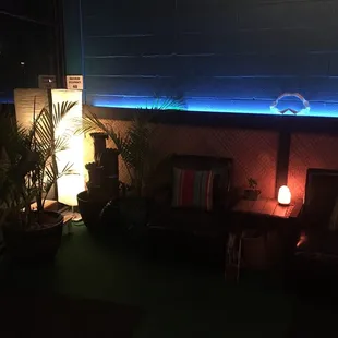 two chairs and a lamp