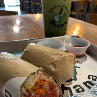 Spicy tuna, green onions, carrots, cucumber, and garlic crispies sushiburrito  and a Sea Turtle boba tea