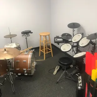 Acoustic and electric drum lesson room.