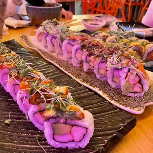 two pieces of sushi on a platter